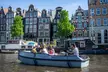 Laat mooi Amsterdam aan je voorbij glijden in een elektrische sloep (tot 51% korting) - Second Medium