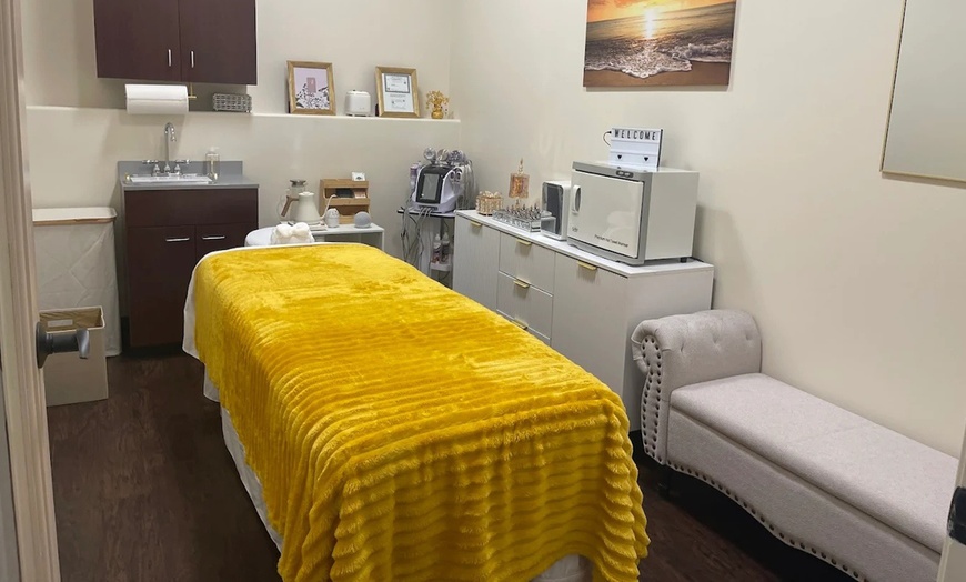 Image 1: 1,3, or 5 60-Min Lymphatic Drainage Massage + Cupping or Hot stones 