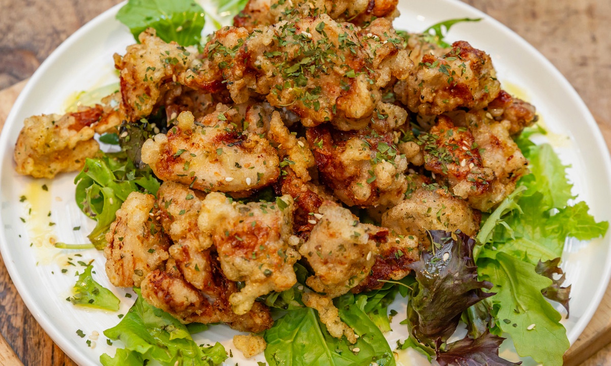 Enjoy Boneless Fried Chicken Platter with House Beer or Wine