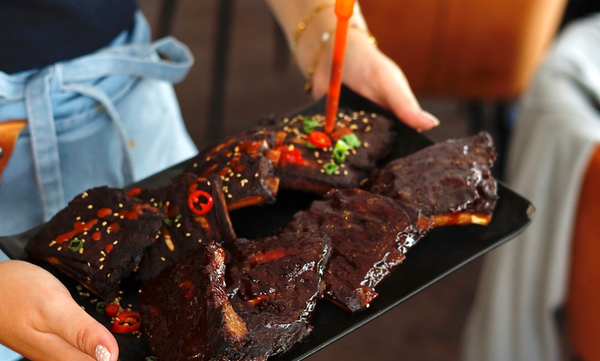 Image 8: Onbeperkt spare ribs eten met uitzicht op het Gooimeer