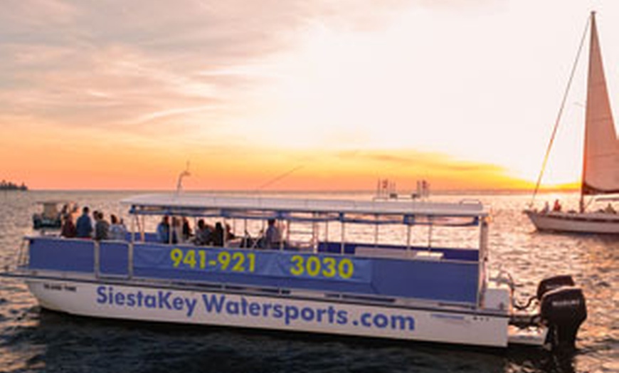 Image 6: Sip, Sail, & Spot Dolphins: Morning, Sunset, & Sandbar Cruise for Up to 6 People w/ Siesta Dolphin Tours (Up to 50% Off)