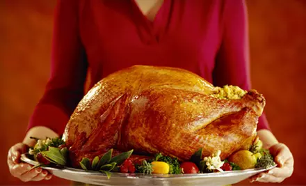 $80 for a Holiday Dinner for 12 with Smoked Bone-In Ham or Smoked Turkey from Andria's Cajun Cuisine in Plano ($165 Value) - Primary Image