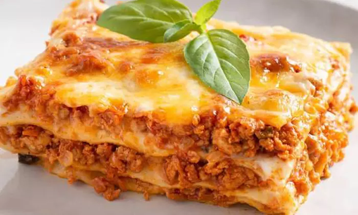 Savor Medium Pizzas or Pasta + Small Garlic Pizza