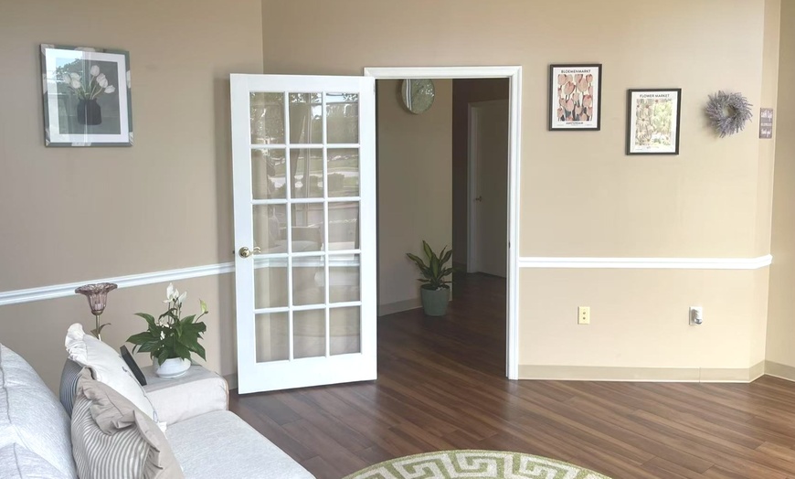 Image 10: Massages for 1 or 2 with Hot Towels, Organic Massage Oil and Lemon Tea