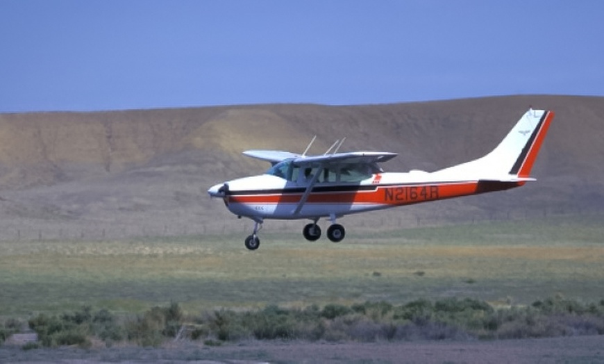 Image 2: Bautismo de vuelo en avión