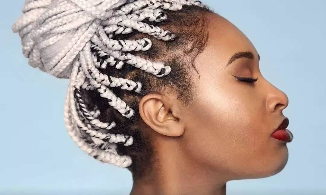 Loc Retwist & Style or Clarifying, or Two Conditioning Treatments, Scalp Massages, & Styles (Up to 37% Off) - Primary Image