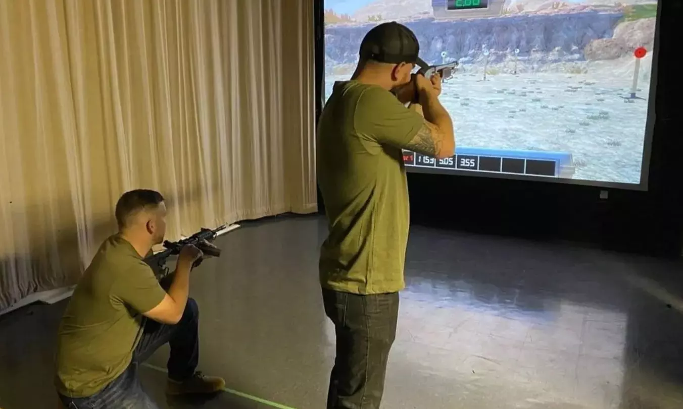 Experience Axis Range's thrilling axe throwing and shooting simulator for groups with up to 41% off. - Second Medium