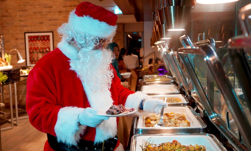 Image 4: Christmas Eve Celebration Buffet with Soft Beverages & Festive Décor 