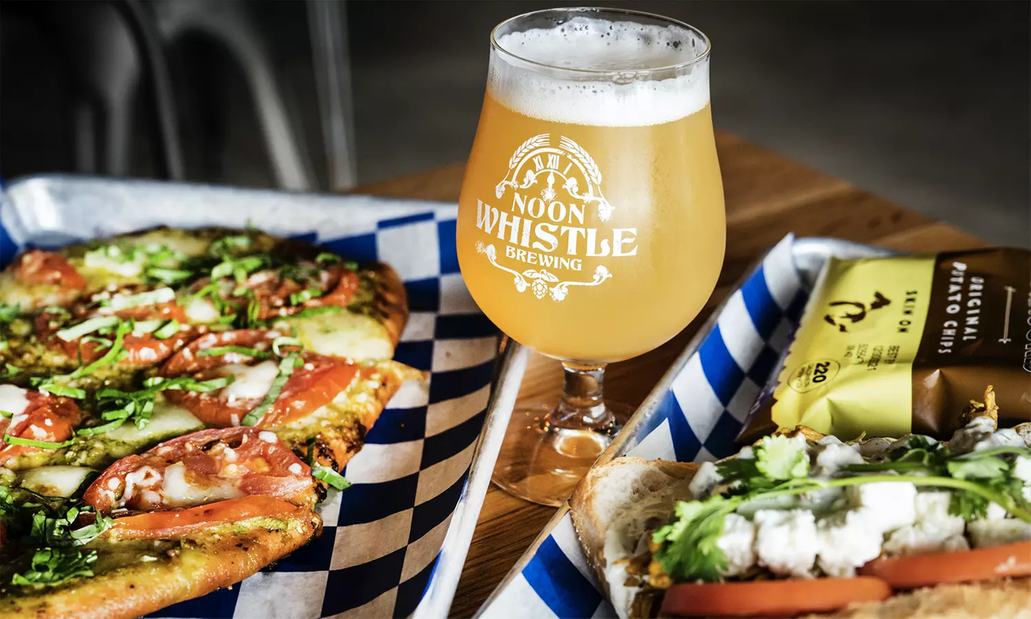 One or Two Pints with Food Credit for One or Two People at Noon Whistle Brewing (Up to 26% Off) - Primary Image