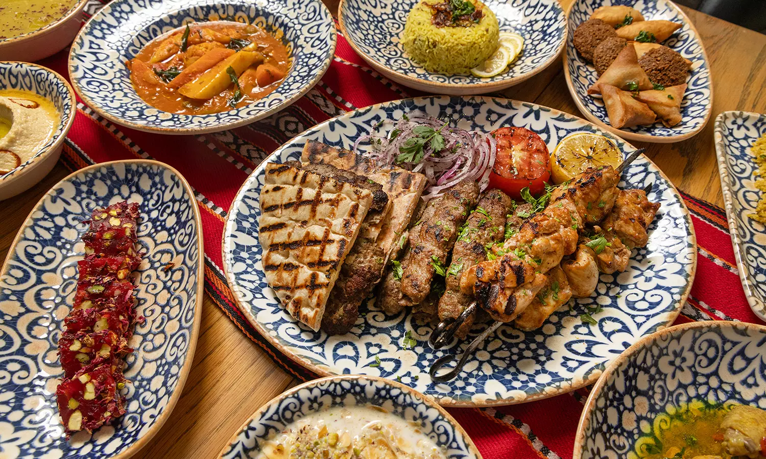 Delight in a 4* Premium Buffet Dinner with Beverages for Child or Adults at Local at TRYP by Wyndham Barsha Heights - Primary Image