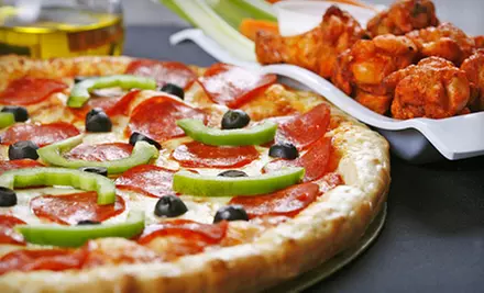 $10 for $24 Worth of Pizza, Wings, and Sandwiches at The Big Slice - Primary Image