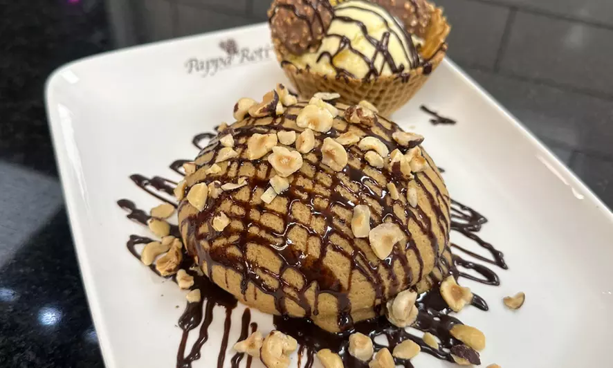 Discover the joy of PappaRoti Las Vegas with vouchers for buns and drinks, offering up to 25% savings - Primary Image