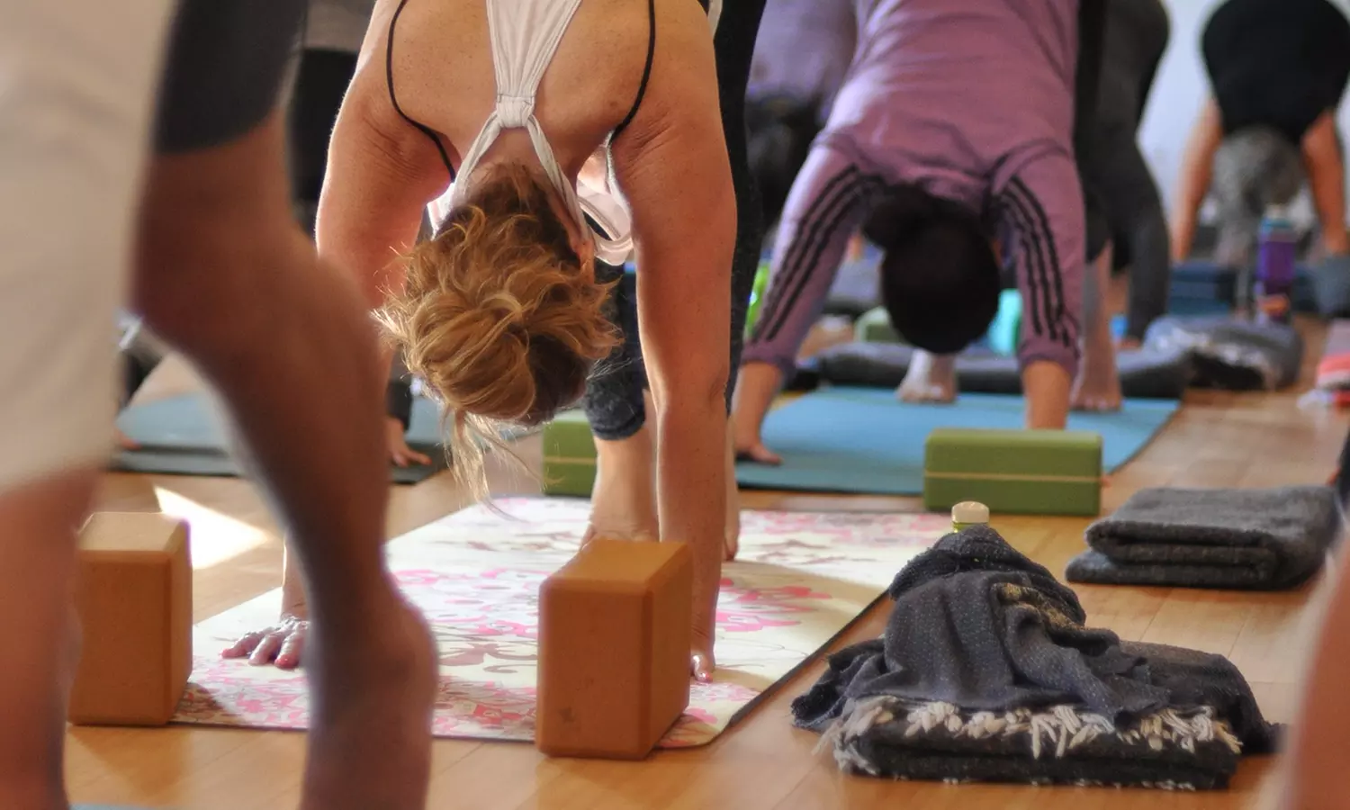 One, Three, or Five Yoga Class for All Levels - In-person or Online at Yoga Mechanics (Up to 52% Off) - Second Medium