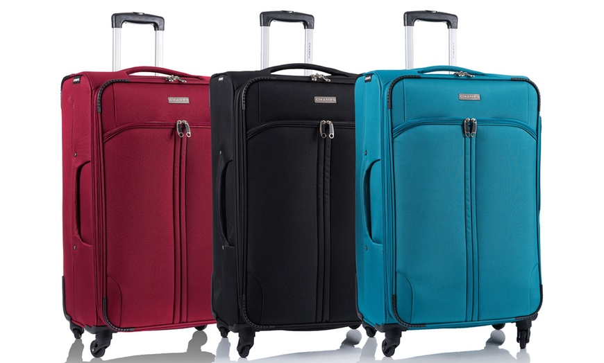 Image 1: 3 Expandable and Wheeled Suitcases