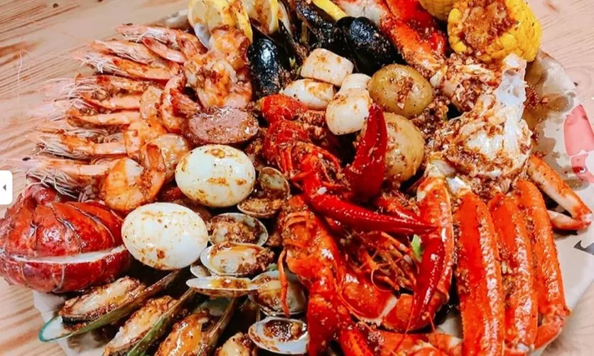Food and Drink for Takeout and Dine-In at The Twisted Crab Seafood & Bar (Up to 30% Off). Two Options Available. - Primary Image