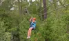 Soar Through the Trees on a 9-Zipline Course for 2-8 People at Adventures Unlimited (Up to 37% Off)