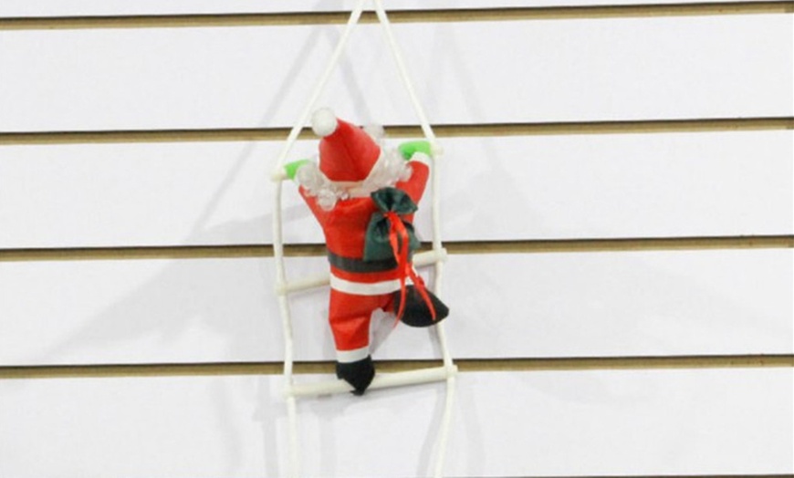 Image 2: Climbing Santa Decoration