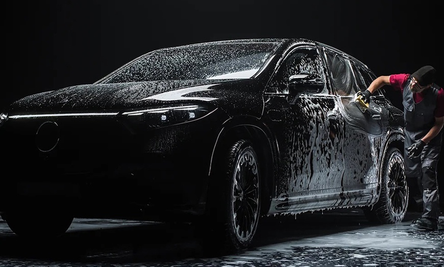 Image 1: Up to 60% Off on Exterior & Interior Car Detail at Finishing Touch Luxury Motorsports Spa