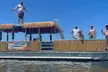 Enjoy Hampton Roads Boat Company's Private Tiki Boat Cruise with Captain for up to 6 or 12 People (Up to 29% Off) - Second Medium