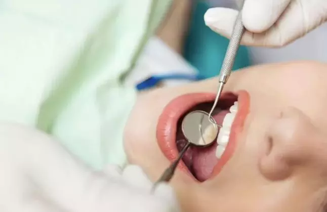 Achieve a Bright Smile with Dental Exam with Scale and Polish