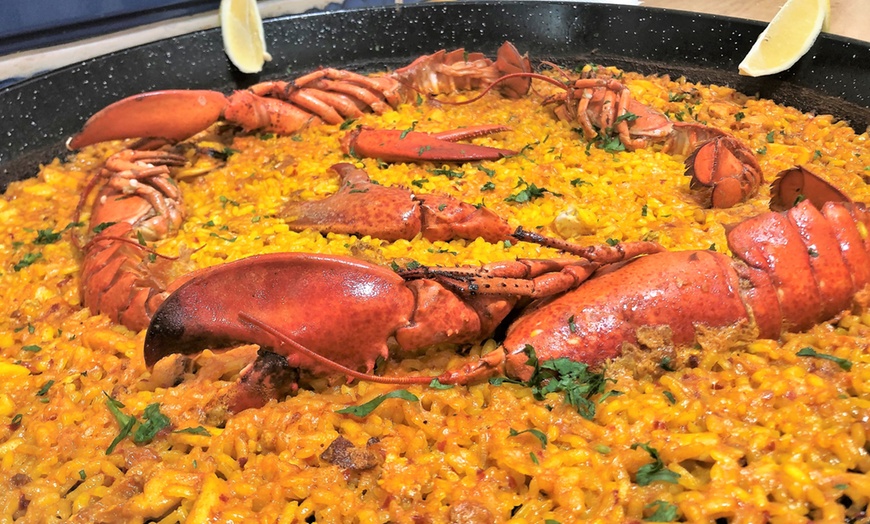 Image 2: Menú de arroces con entrante y botella de vino para 2 o 4