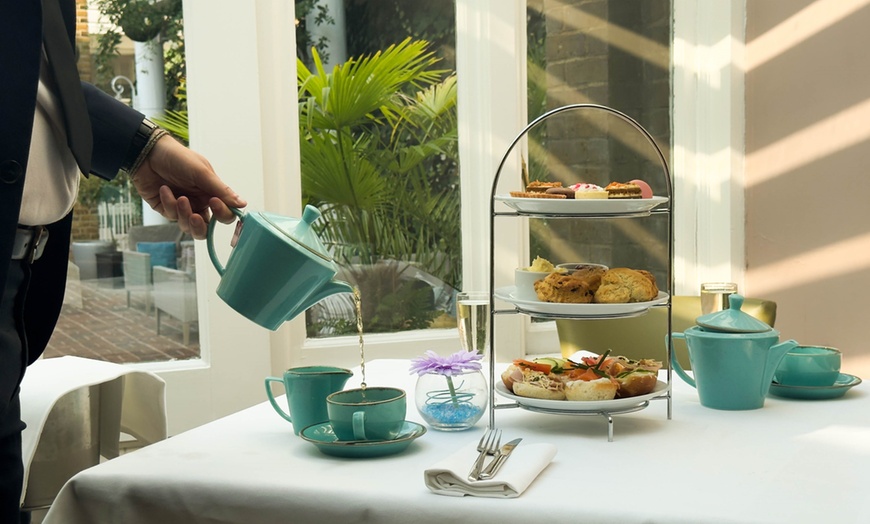 Image 1: A Premium Afternoon Tea for 2 or 4, with Glass or Bottle of Prosecco  