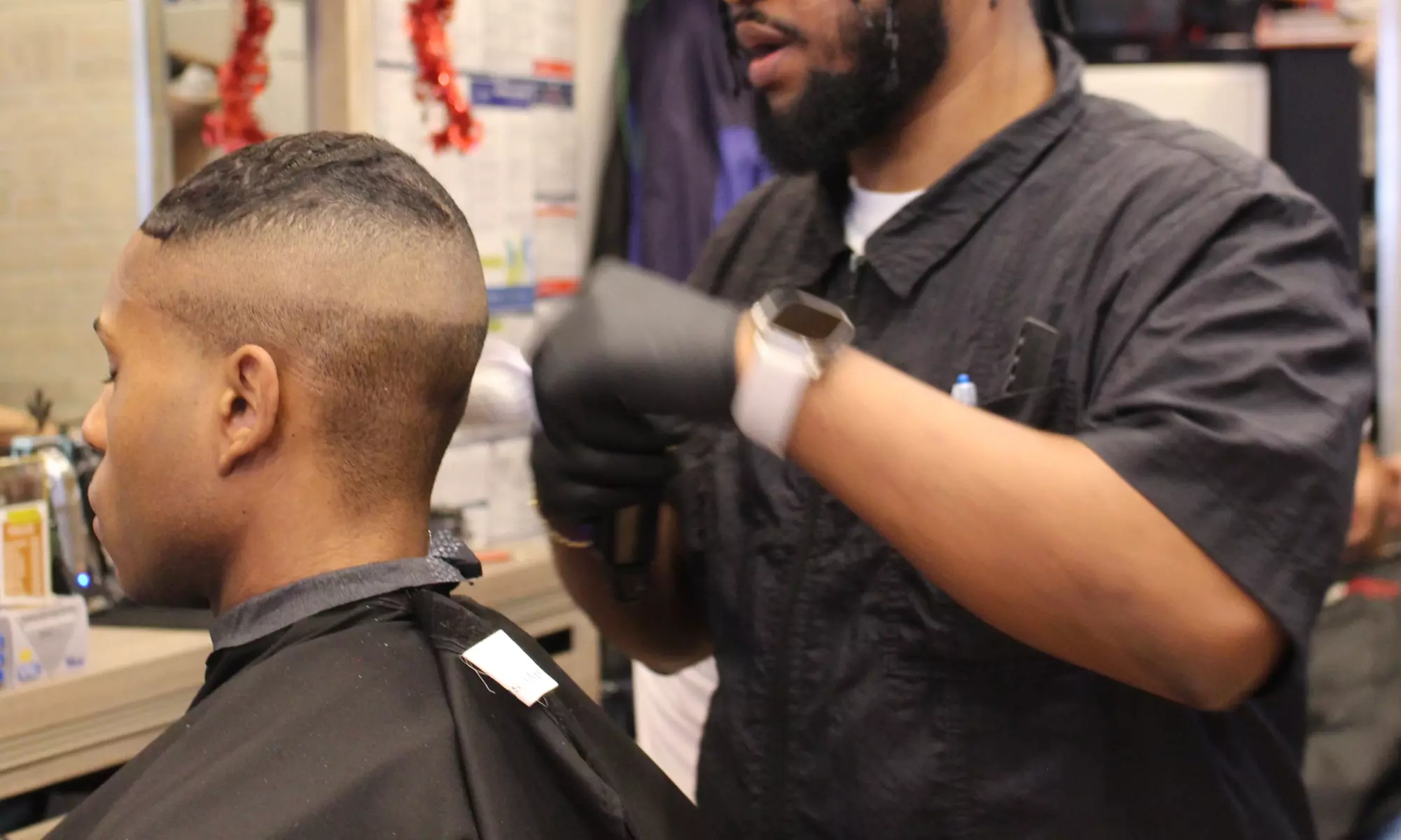 Men's Professional or Expert Haircut with Optional Hot Towel or Hot Lather Shave (Up to 50% Off) - Primary Image