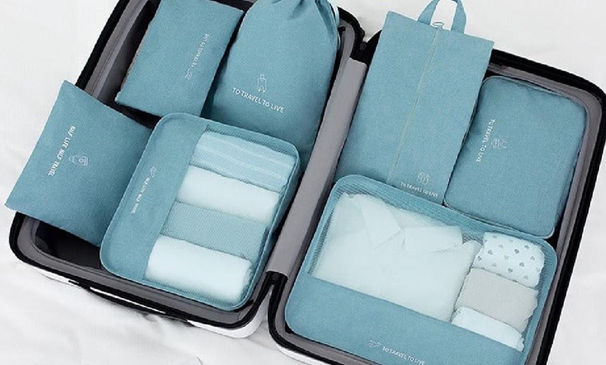 Image 6: Seven Packing Cubes for Suitcases