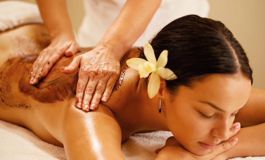 Image 3: Indulge in a 60-Min Custom Massage with Hot Towels & Organic Oils!