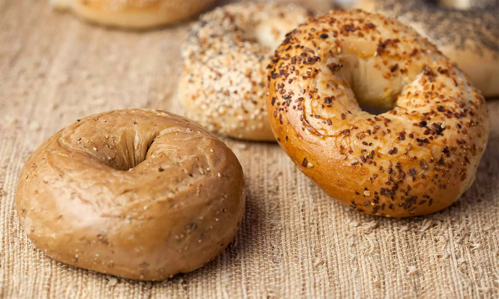$14 for Four Vouchers, Each Valid for $5 Worth of Bagels and Sandwiches at Bagel World Cafe ($20 Value) - Primary Image