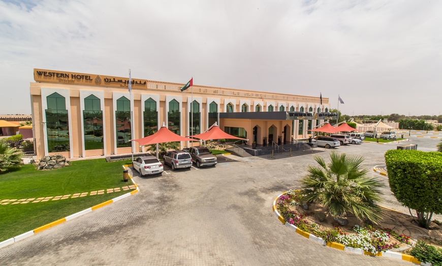 Image 1: Al Gharbia: 1- or 2-Night Family Stay with Meal Options