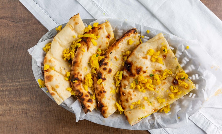 Image 8: Authentic Indian Cuisine & Lively Dining with Food & Drink Credit