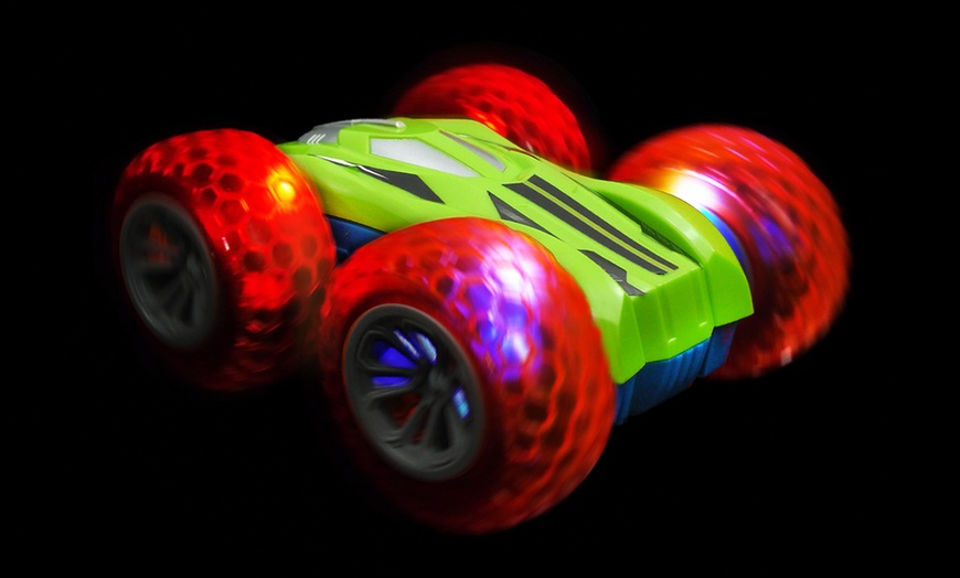 Image 1: RC Light-Up Flip and Spin Car