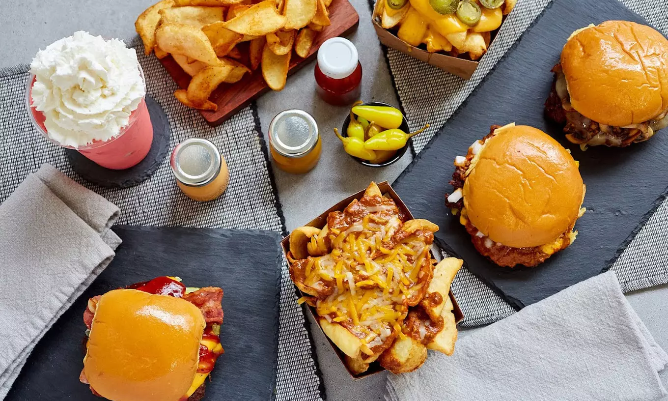 Savor Chicago-style Cuisine at Juicy J’s Burgers And Wings(Up to 30% Off) - Primary Image