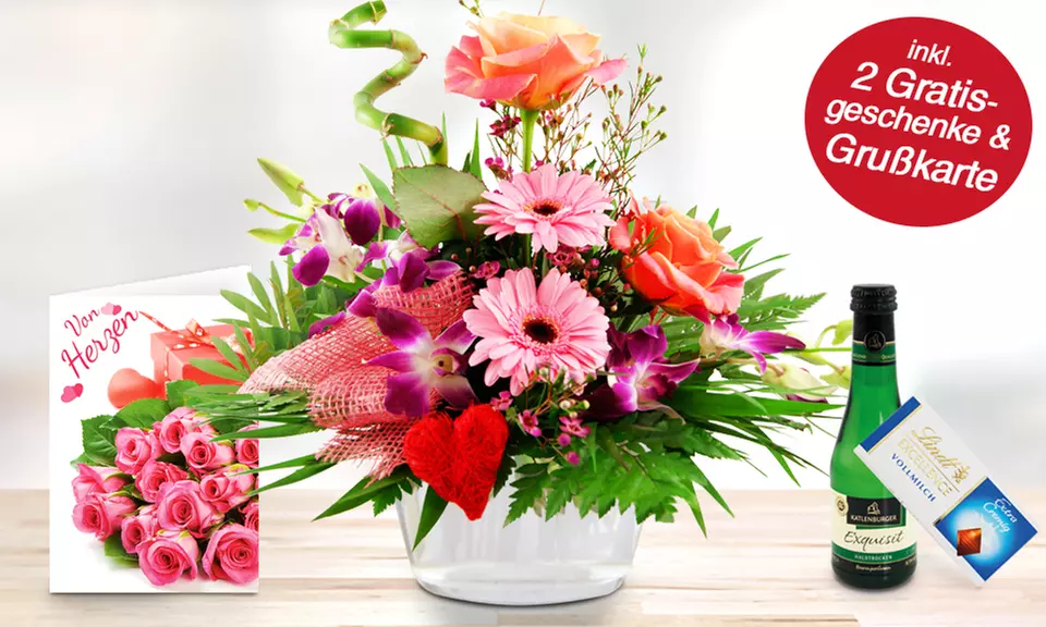 Blumenstrauß oder Blumen-Gesteck mit Schokolade, Piccolo und Grußkarte