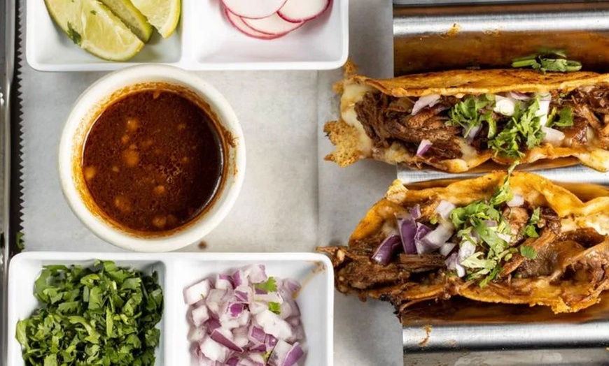 Image 15: Vibrant Rooftop Dining: Choose Meals, Margaritas, or Dining Credit