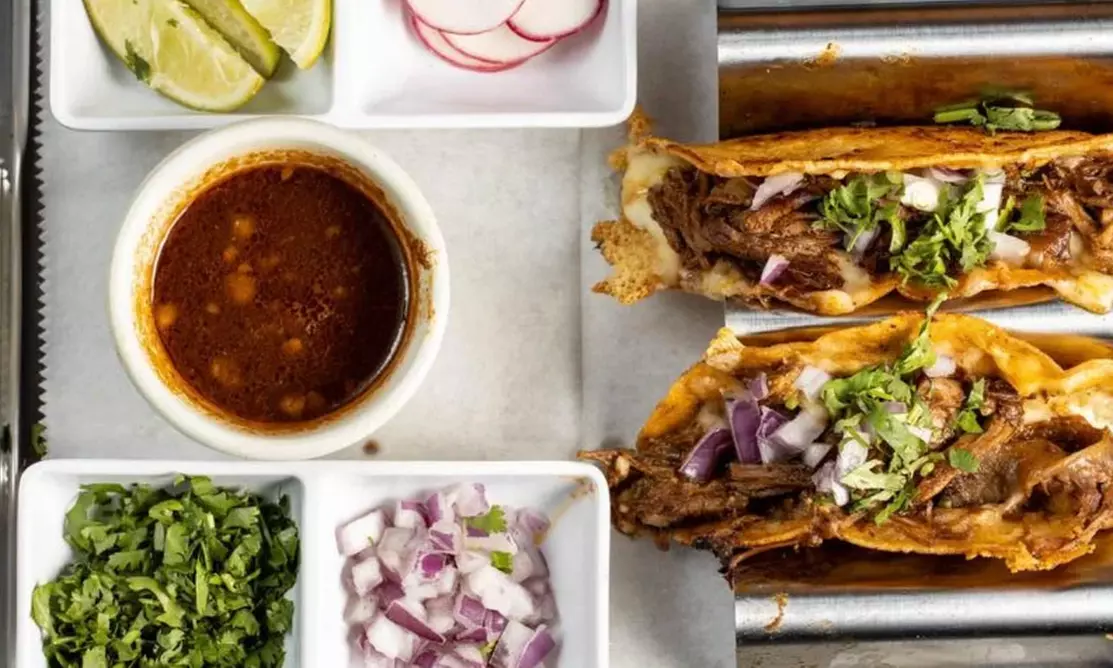 Vibrant Rooftop Dining: Choose Meals, Margaritas, or Dining Credit