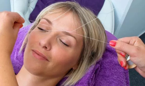 Two Eyebrow Threading Sessions or One Full Face Threading Session at Magni Brows (Up to 50% Off) - Primary Image
