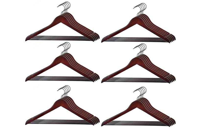 Image 6: 10 Wooden Hangers