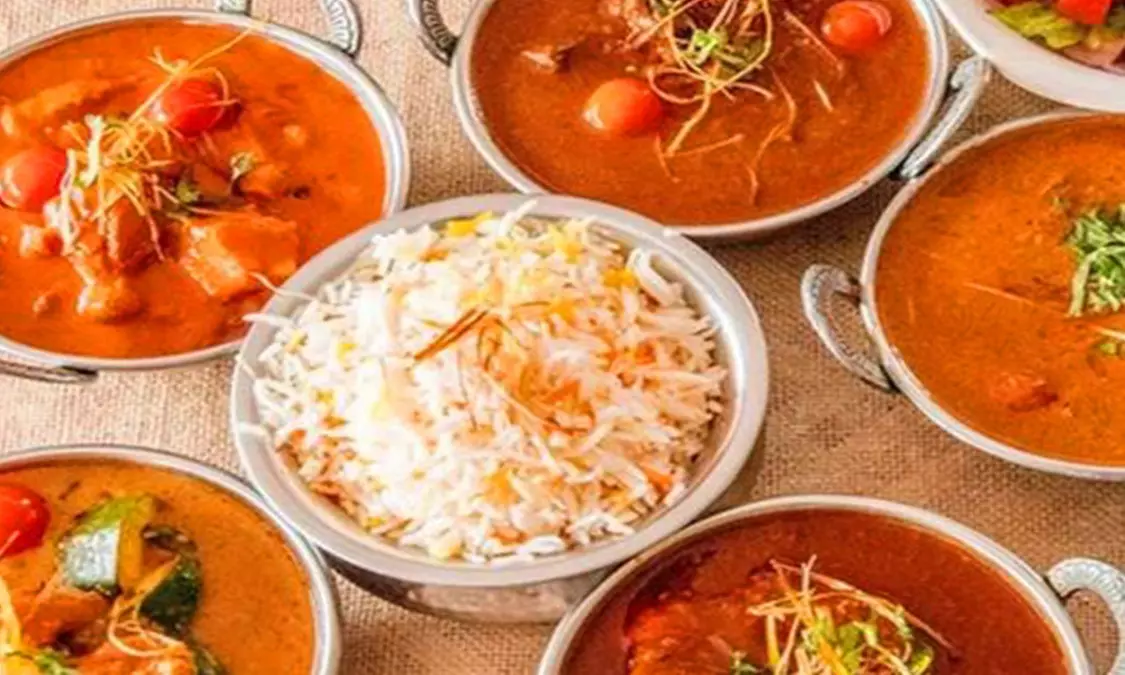 Indian dinner for two or four with appetizers and curry delights