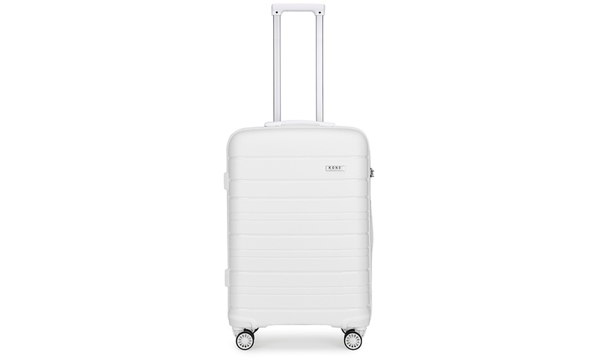 Image 27: Four Piece Travel Suitcase Set