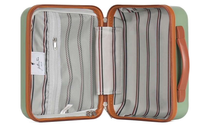 Image 22: Four Trolley Suitcases Set