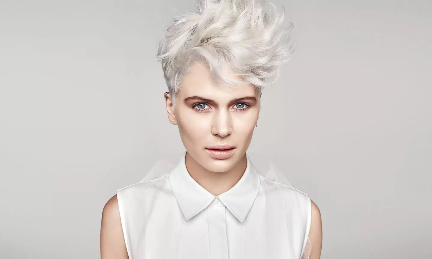 $20 for Haircut or Style with Deep Conditioning Treatment at Paul Mitchell School ($46 Value) - Primary Image