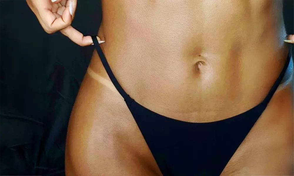 Custom Spray Tan With or Without Hydration Boost at The Cosmetic Collective(Up To 34% Off) - Primary Image