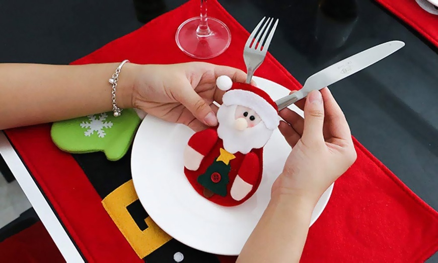 Image 5: Upto 12 Packs of Snowman Xmas Cutlery Holders