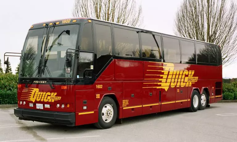 Round-Trip Charter-Bus Service from Quick Shuttle Service (Up to 43% Off). Three Options Available. - Primary Image