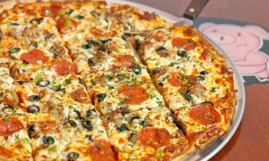 Wings, Bacon, Burgers, Pizza, and More at Saloon on Calhoun (Up to 40% Off) - Second Medium