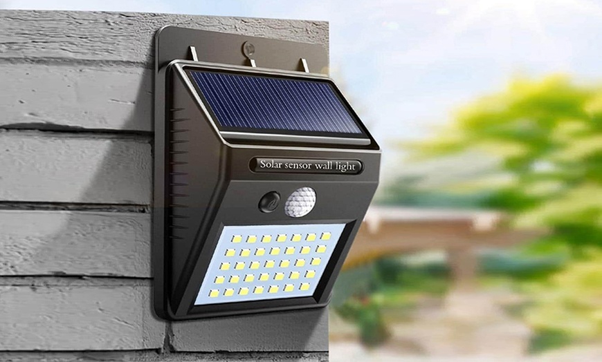 Image 7: Up to Four LED Wall Lights with Solar Panel and 120° Motion Sensor