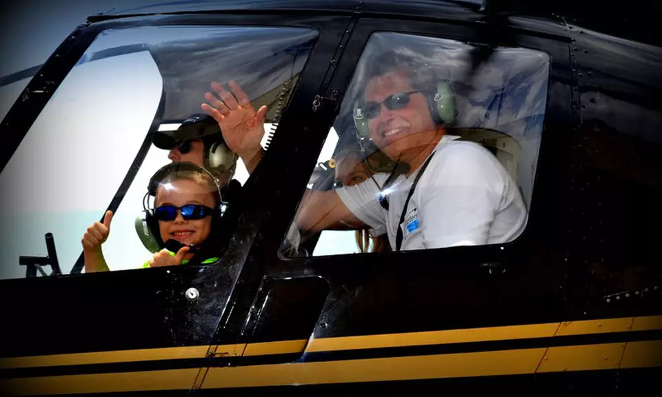 7-Mile or 14-Mile Helicopter Flight for Up to Three from KC Copters, A Johnny Rowlands Company (Up to 48% Off)  - Primary Image