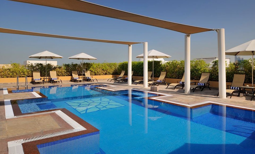 Pool and Health Club Access - The Pool at 5* Mövenpick Al Mamzar | Groupon